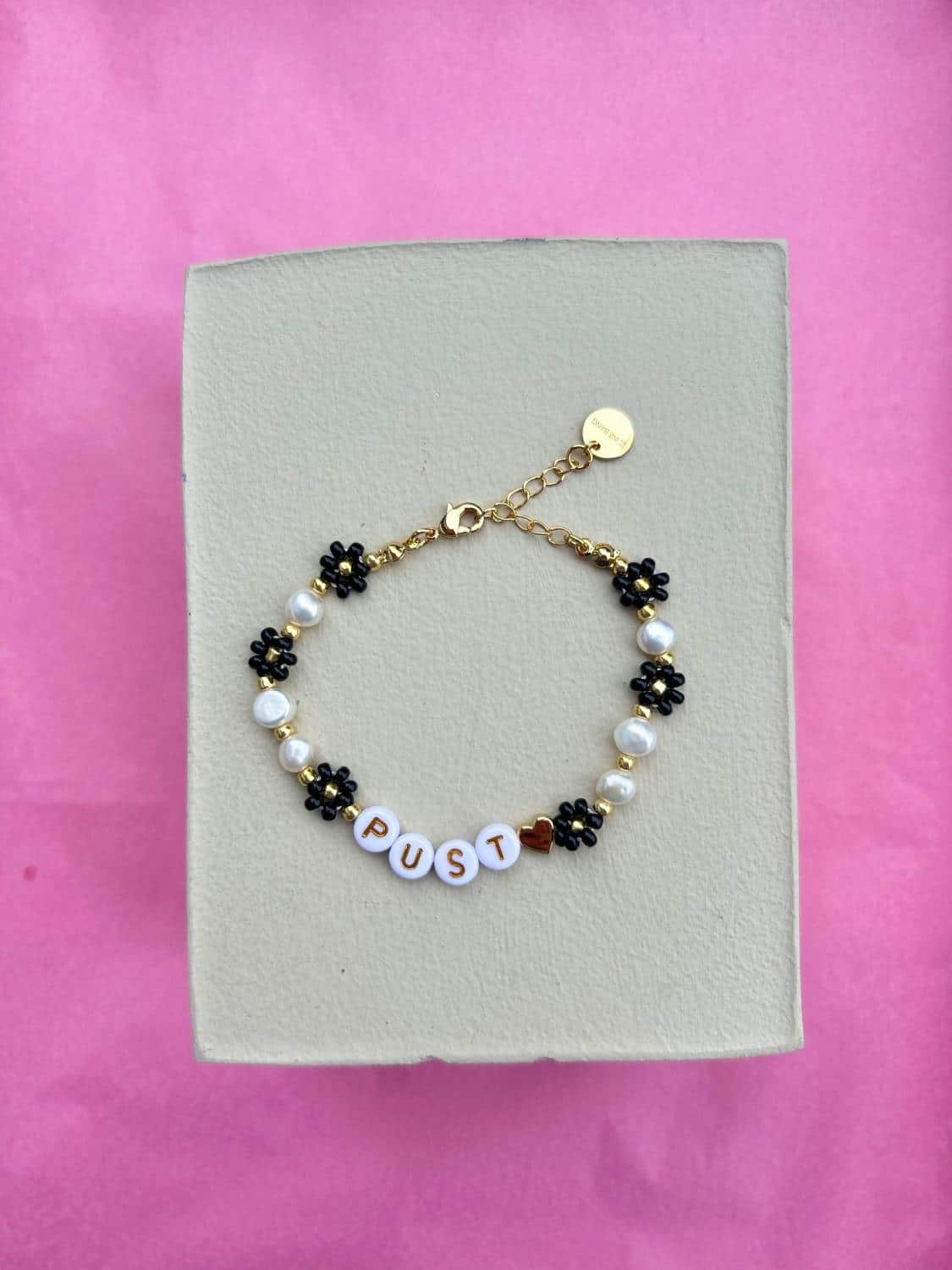 Eline Bang Pust Blomstearmbånd Sort